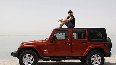 To the untrained eye, the back seat of Aimee Warren's Jeep Wrangler Unlimited looks like a rubbish dump. She says she has a tendency to hoard possessions .
