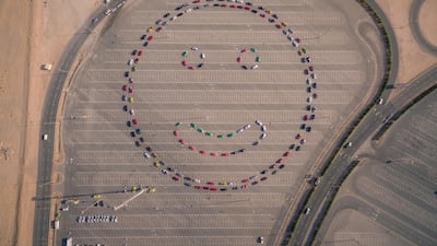 Dubai Police create a smiley face using cars. Courtesy Dubai Police