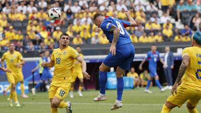 Ondrej Duda heads home for Slovakia to make it 1-0. EPA