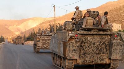 Lebanese army troops patrol near the Syrian border . AFP / STR
