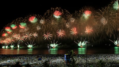 Fireworks explode over Copacabana Beach during New Year's celebrations in Rio de Janeiro. AP