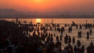 Hindu devotees bathe on the banks of Sangam, the confluence of the holy rivers Ganges, Yamuna and the mythical Saraswati, during the Kumbh Mela in Allahabad, India, last month. Daniel Berehulak / Getty Images