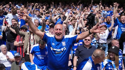 Ipswich Town supporters celebrate their side’s first goal. PA