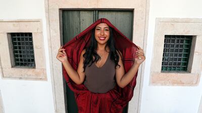 A Tunisian woman wears a traditional veil called 'Sefseri' on National Women's Day in Tunis. The Sefsari is a traditional feminine veil in silk, cotton or satin worn in the Maghreb.