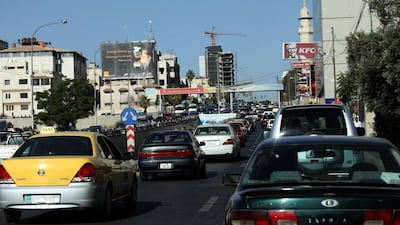Heavy traffic is seen on one of the main streets of the capital city of Amman, Jordan, on June 13, 2012. Jordan’s government on Wednesday raised the price of fuel used in public transport, sparking calls for protests. Mohammad Hannon/AP Photo