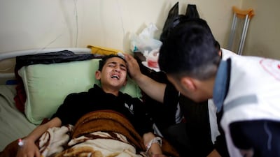 A young Palestinian wounded at the Israel-Gaza border is treated at Al Shifa hospital in Gaza City. Mohammed Salem / Reuters