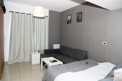 Mr Abdal Rahman pays Dh28,000 in rent for a studio apartment at LakeSide tower in Production City. Pawan Singh / The National