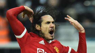 Manchester United attacker Edinson Cavani celebrates after scoring in the Premier League draw at Newcastle United on December 27, 2021. EPA