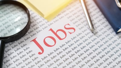 One recruitment agent demanded a bank transfer of Dh1,200 plus VAT to secure three interviews. Getty Images