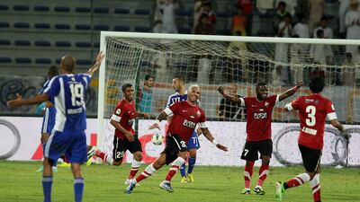 Ricardo Quaresma, centre, scored Al Ahli's first goal during their away win against Al Nasr, their Dubai rivals, on Friday. Pawan Singh / The National