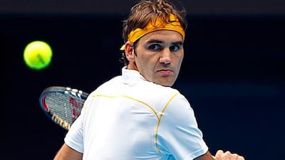 Roger Federer concentrates during his quarter-final match against fellow Swiss Stanislas Wawrinka.