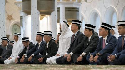 Sheikh Mohamed bin Zayed and Sultan Abdullah, attend Friday prayers at Sheikh Zayed Grand Mosque.