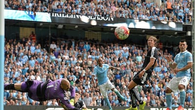 Manchester City's Fernandinho shoots and scores his side's second goal in their victory over Watford on Saturday in the Premier League. Peter Powell / EPA