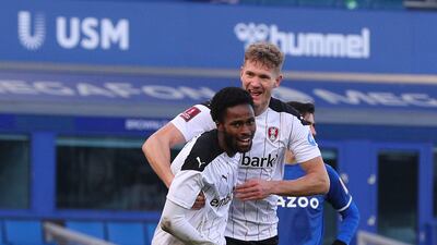 Rotherham's Matthew Olosunde celebrates scoring. PA