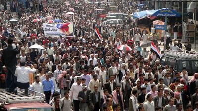 Sanaa // Yemen. September 19 2011. Thousands of Yemenis rally in the city of Ibb, 190 kilometres southwest of Sanaa, against the deadly clashes between anti-government protesters and security forces in the capital. STR / AFP Photo
