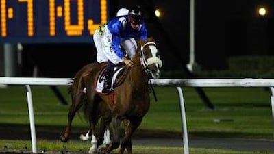 Dane O'Neill enjoys the ride aboard Quite A Show in winning the featured event at Meydan Racecourse on Thursday night, the Mazrat Al Ruwayah..