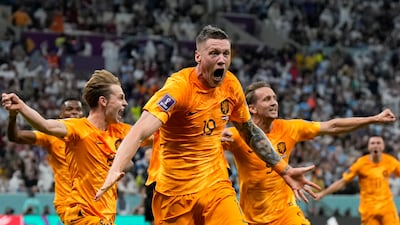 Wout Weghorst celebrates after making it 2-2. AP