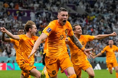 Wout Weghorst of the Netherlands, centre, celebrates after scoring his side's second goal in the World Cup quarter-final against Argentina at Lusail Stadium, Qatar, on December 10, 2022. The forward has joined Manchester United on loan. AP