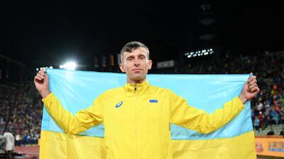 Bronze medalist Andriy Protsenko of Ukraine celebrates after the men's high jump final on day eight of the European Championships in Munich, Germany. Getty