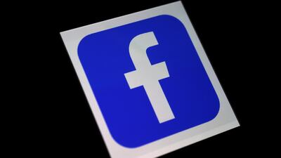 In this file photo taken on March 25, 2020 in this photo illustration a Facebook App logo is displayed on a smartphone in Arlington, Virginia. Facebook; The Oxford Internet Institute has warned of catastrophic consequences if social media giants suddenly fail AFP