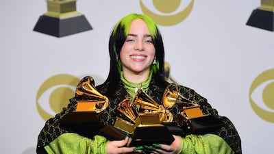 US singer-songwriter Billie Eilish poses in the press room with the awards for Album Of The Year, Record Of The Year, Best New Artist, Song Of The Year and Best Pop Vocal Album. AFP