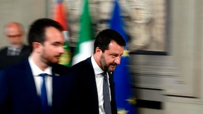 Matteo Salvini, right, sought to capitalise on a growing lead in the opinion polls by destroying the coalition his far-right League had joined as a junior partner with the Five Star group last year. AFP