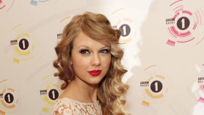 Taylor Swift, in a lace skater dress, attends BBC Radio 1's Teen Awards at Hammersmith Apollo, on November 14, 2010 in London, England. Getty Images