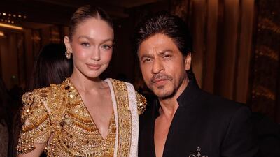 Gigi Hadid with Bollywood superstar Shah Rukh Khan at the opening of the Nita Mukesh Ambani Cultural Centre in Mumbai on April 1. Photo: Instagram / gigihadid