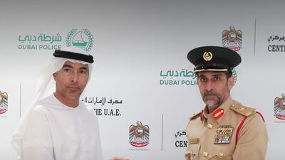 The UAE Central Bank the Dubai Police signed a pact to promote co-ordination on information exchange related to financial crimes. Photo: UAE Central Bank