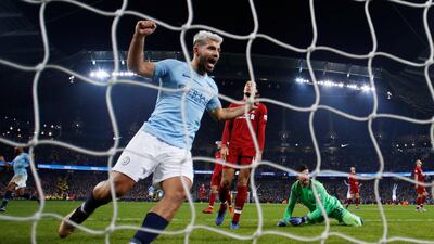 Manchester City's Sergio Aguero celebrates their second goal scored by Leroy Sane. Reuters