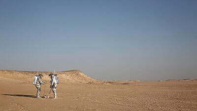 Two scientists test space suits and a geo-radar for use in a future Mars mission in the Dhofar desert of southern Oman on Wednesday February, 2018. The desolate desert resembles Mars so much that more than 200 scientists from 25 nations organised by the Austrian Space Forum are using it for the next four weeks to field-test equipment. Sam McNeil / AP