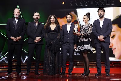 From left to right: Jury president Luca Guadagnino; actors Toufic Danial and Manar Shehab; screenwriter Mona Copti; Jiries Copti and Tony Copti receive the Etoile d'Or award for Happy Holidays at Marrakech International Film Festival. AFP