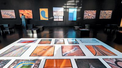 Crowds take in the new exhibit of aerial photography. Courtesy Manarat Al Saadiyat.