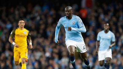 Manchester City's Yaya Toure coin action during the game. Martin Rickett / AP Photo