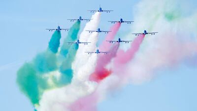 The Frecce Tricolori aerobatic squad perform in the skies over Rome to mark the 100th anniversary of the Italian Air Force. AP