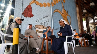 Customers sit in a coffee shop at Souk Al Mubarakiya traditional market, Kuwait City, Kuwait. EPA