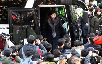 Hyon Song-wol gets off a bus as she arrives at the Seoul Train Station. AP