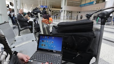 The US banned electronic devices larger than a mobile phone from passenger cabins of direct flights from eight countries in the Middle East, North Africa and Turkey, including Qatar and the UAE. It was later lifted in several countries, including the UAE. Photo: AFP