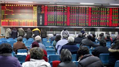 Recent economic data point towards a bumpy growth in China, the world’s second biggest economy and one of the biggest markets for GCC oil. Above, a securities exchange house in Shanghai. EPA