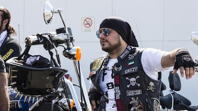 Bikers taking a break midway into their Abu Dhabi to RAK ride to celebrate UAE National Day, on December 2, 2016. Duncan Chard for The National