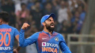 India's captain Virat Kohli celebrates the dismissal of West Indies' Nicholas Pooran in Mumbai on Wednesday. AP