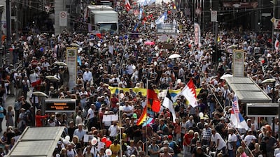 People attend a rally in Berlinagainst the German government's coronavirus restrictions, on August 29, 2020. Reuters