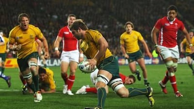 Australia's Ben McCalman goes over to score and seal victory for the Wallabies against Wales in the play-off for third place at Eden Park.