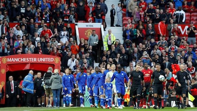The players come out onto the pitch before the match. Reuters