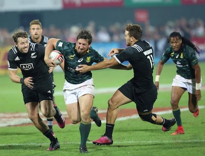 Kwagga Smith, centre, produced a man of the match performance in the Dubai Rugby Sevens final. Satish Kumar / Reuters