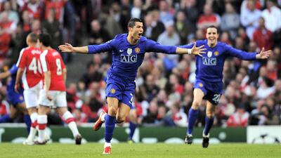 Cristiano Ronaldo of Manchester United celebrates scoring the second goal of the game during the Champions League Semi Final 2nd leg against Arsenal in 2009. Getty Images