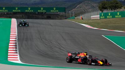 Max Verstappen and Valtteri Bottas at the Portuguese GP. AP