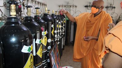 Oxygen cylinders reach hospitals in western India overwhelmed by a rapid rise in Covid-19 cases.