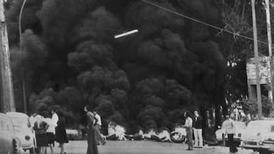 Smoke rises during clashes between Palestinian fighters and members of a Lebanese Christian militia in Beirut, on April 15, 1975.