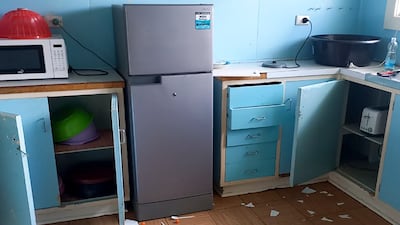 Debris lies strewn across the floor in the kitchen of Renagi Ravu's house in Kainantu, following the quake.
